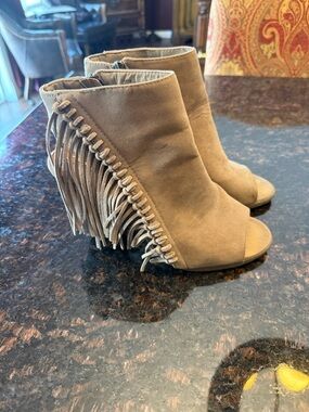 Suede Fringe Peep-Toe Ankle Boots in Tan